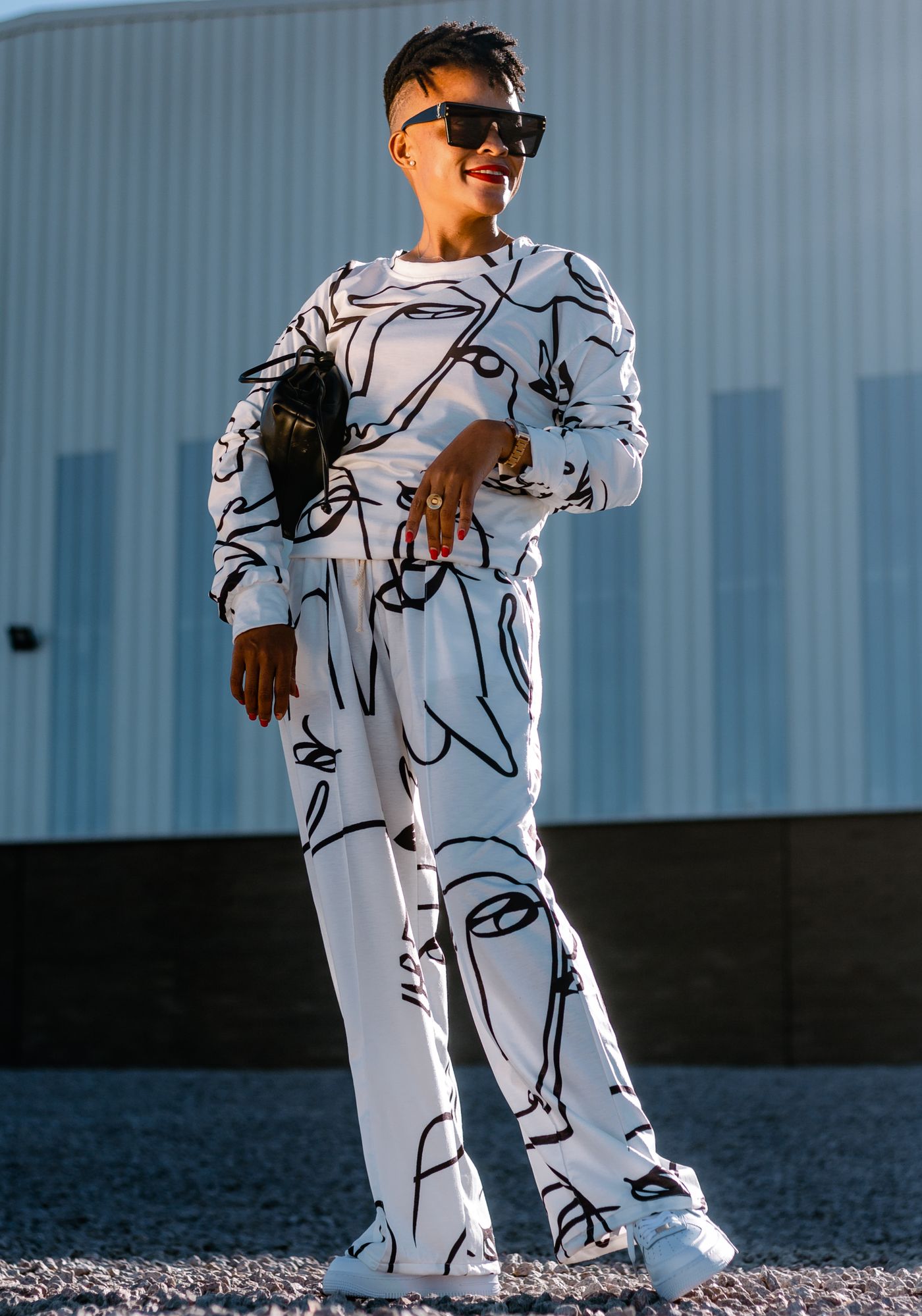 A matching graphic-print top and trousers worn together.