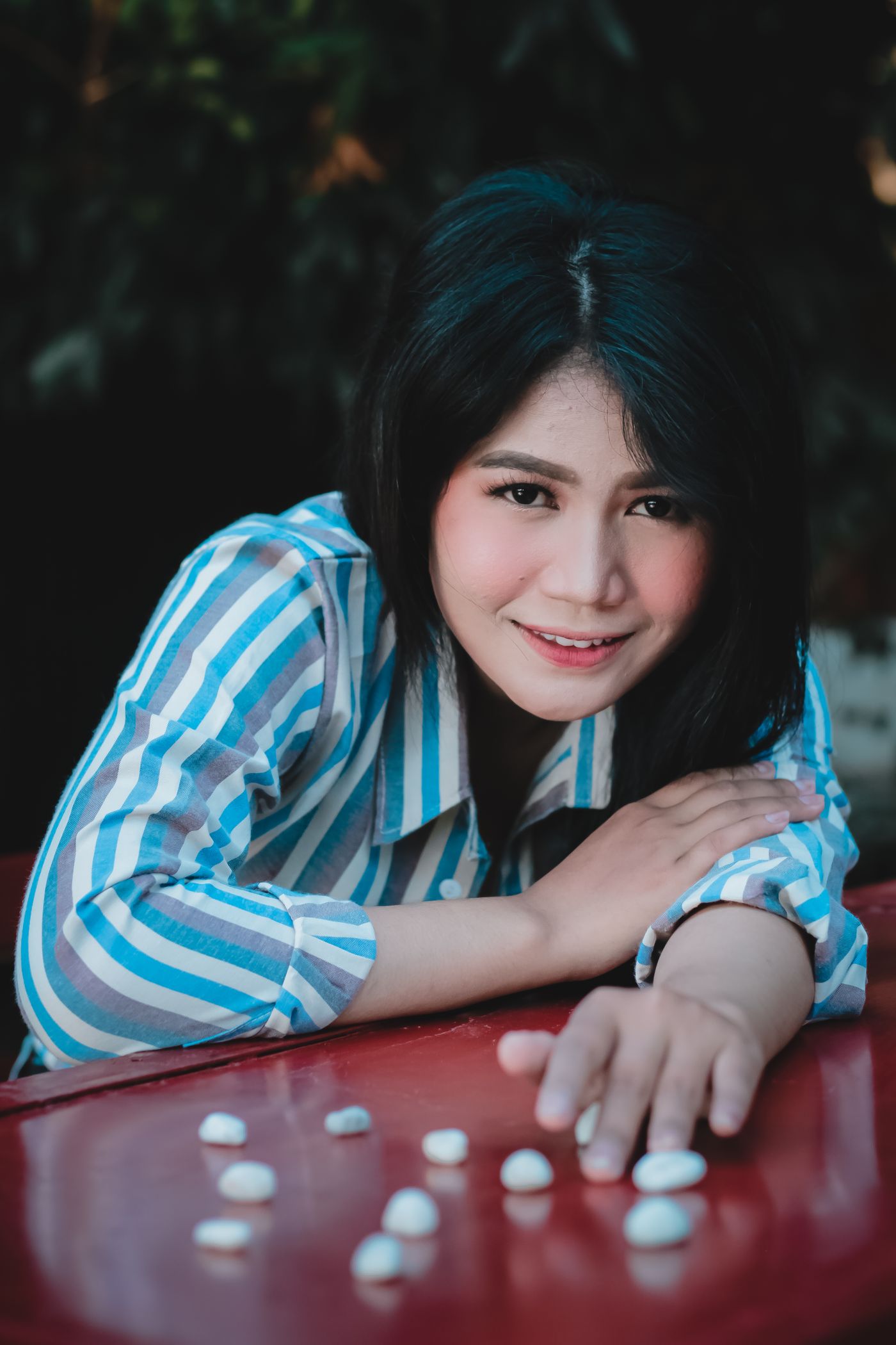 A blue and white striped shirt worn outdoors.